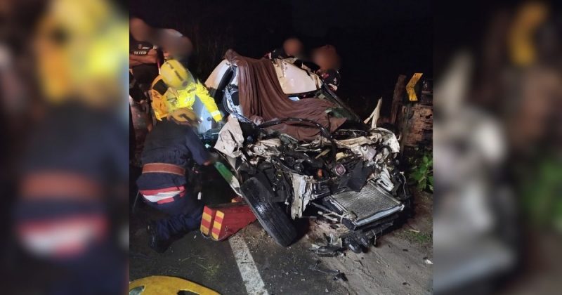 Vítima fica presa às ferragens após acidente entre caminhão e carro